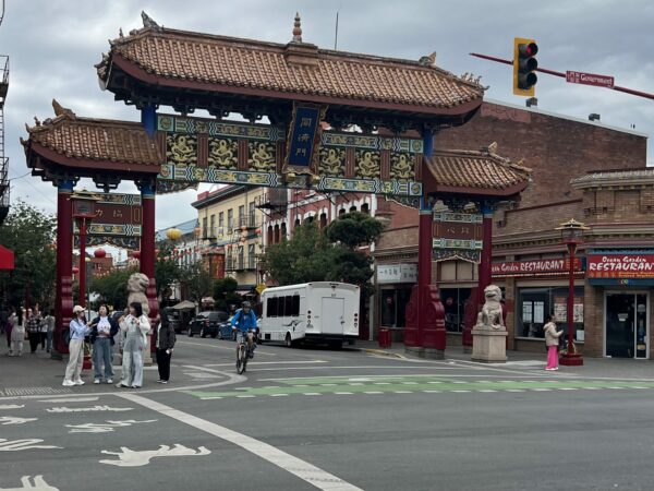 International District shot of large red arch in Victoria.